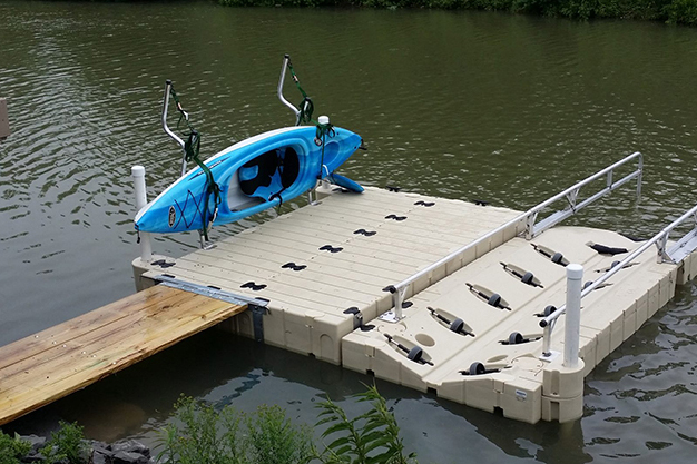 dock with kayak launch and kayak smaller