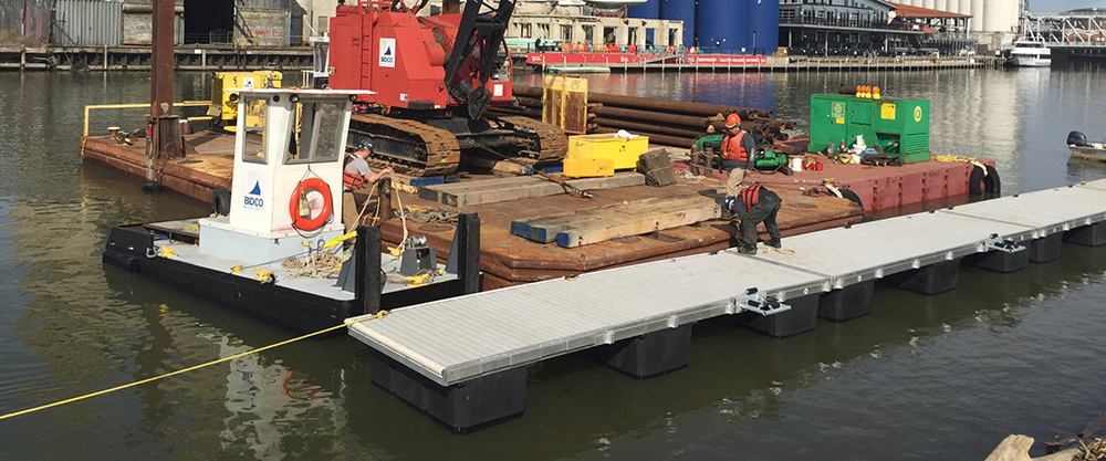 Large Dock being put into water